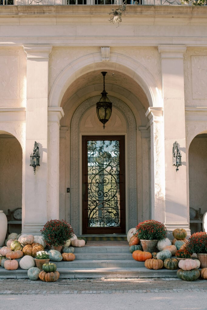 front steps of commodore perry mansion with halloween pumpkins